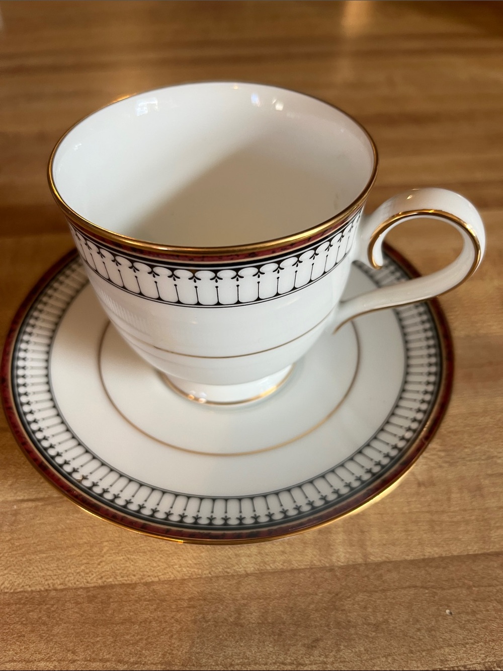 Noritake White Fine China Cup and Saucer with a Black/Maroon/Gold Band